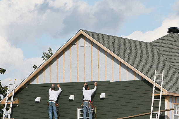Professional Siding technician working in Millington, NJ